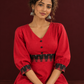 Vibrant Red Cotton Fit & Flare Dress with Contrast Black Ikat Waistband & Matching Cuffs — seated detail
