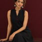 Timeless Black Cotton Sleeveless One Piece Dress with Mandarin Collar & Contrast Ajrakh Striped Hemline Panel — seated detail