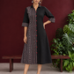 Timeless Black Cotton Shirt Dress with Contrast Striped Panel & Coordinated Sleeve Cuffs — side view