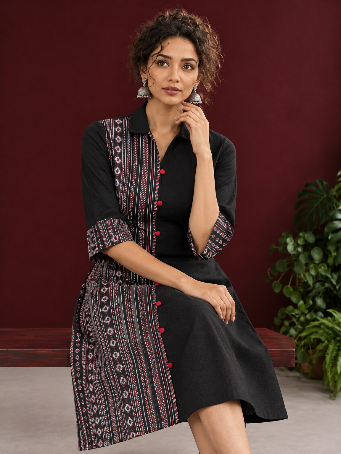 Timeless Black Cotton Shirt Dress with Contrast Striped Panel & Coordinated Sleeve Cuffs — seated detail