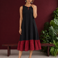 Classic Black Cotton Silk Dress with Keyhole Neckline and Contrast Maroon Ruffle Hem — front view