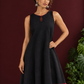 Classic Black Cotton Silk Dress with Keyhole Neckline and Contrast Maroon Ruffle Hem — fabric detail