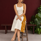 Elegant Off-White Cotton One Piece Dress with Mustard Floral Print Side Panel & Button Detailing — seated