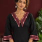 Classic Black Cotton A-line Dress with Contrast Maroon Ikat Collar and Matching Sleeve Cuffs — fabric detail