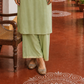Elegant pista Green Kurta with Golden Floral brocade Yoke, appliqué Sleeve hem