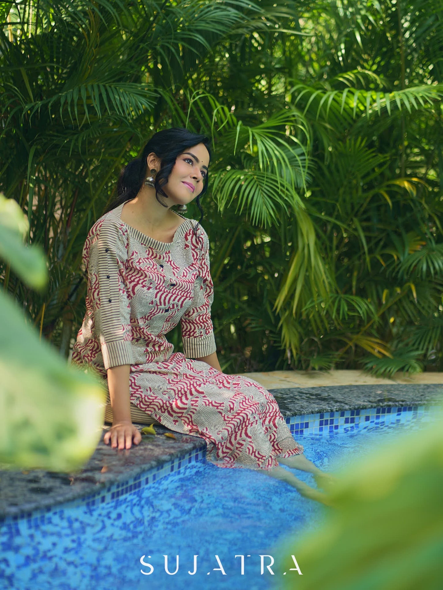 Artisanal Ajrakh Print Kurta with Animal Motifs, Boat Neckline, and Striped Highlights