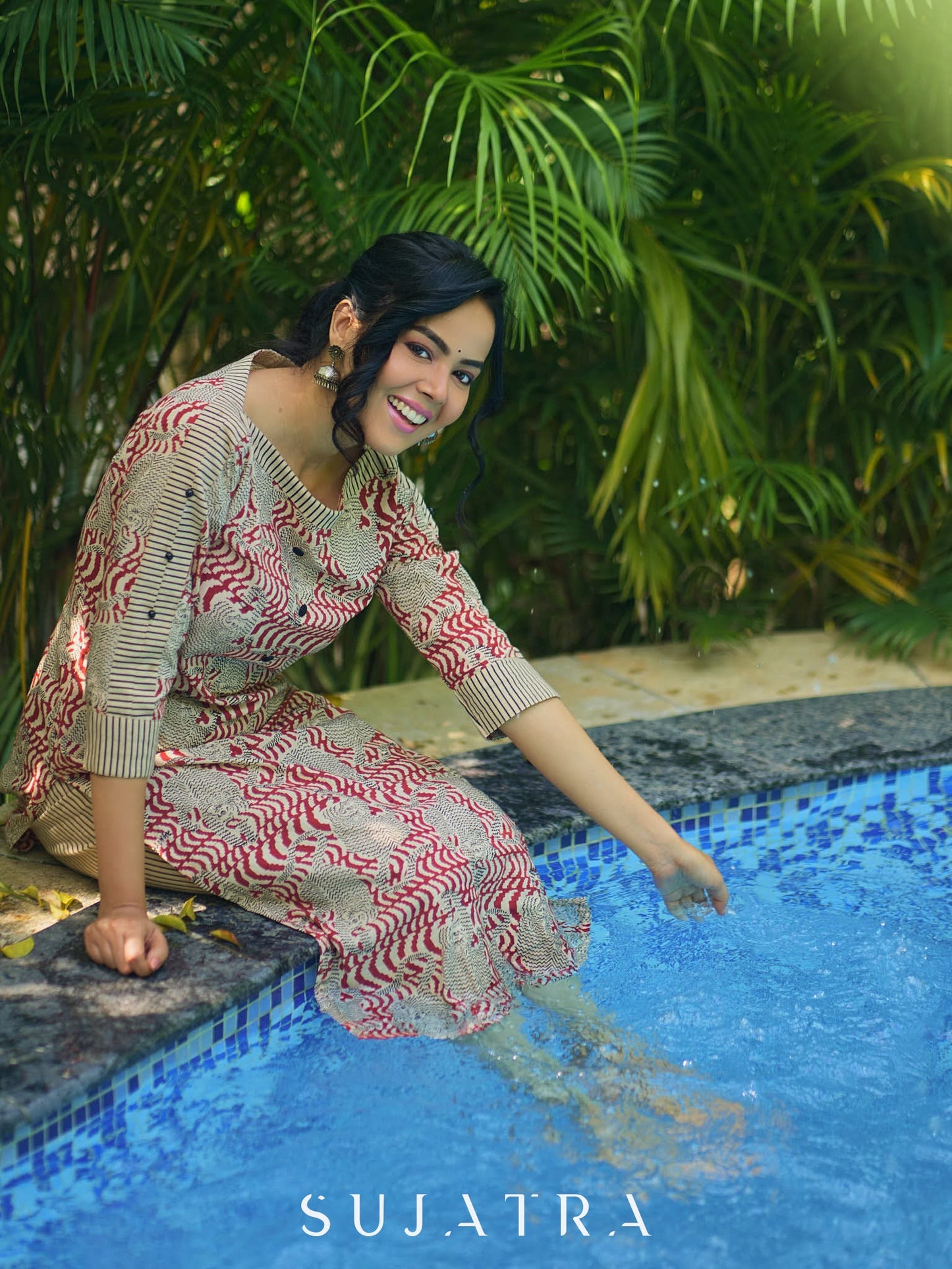 Artisanal Ajrakh Print Kurta with Animal Motifs, Boat Neckline, and Striped Highlights