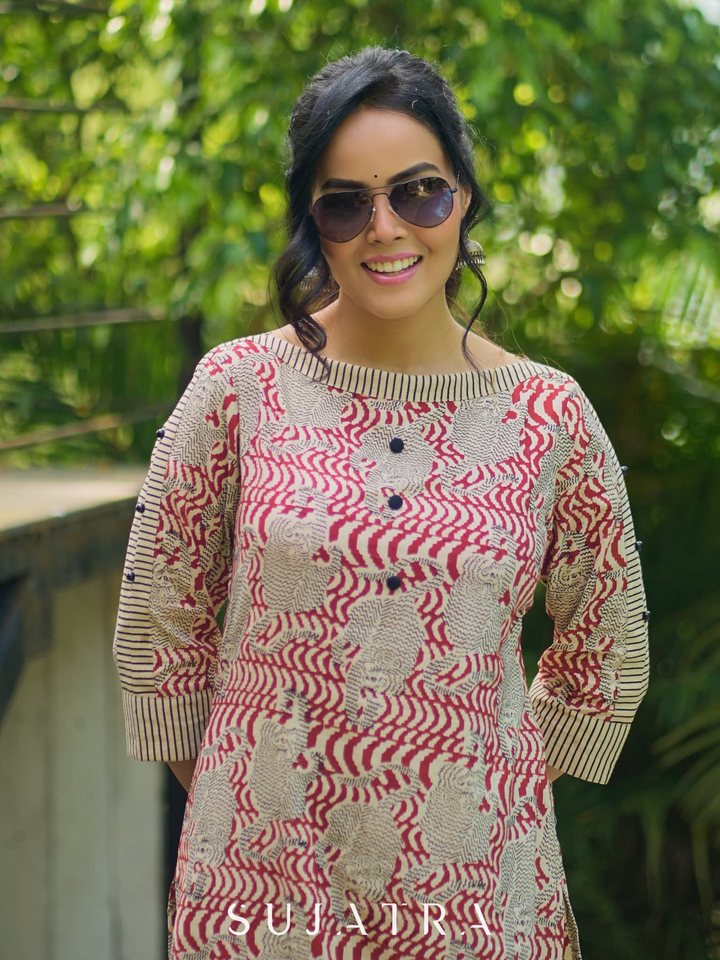 Artisanal Ajrakh Print Kurta with Animal Motifs, Boat Neckline, and Striped Highlights
