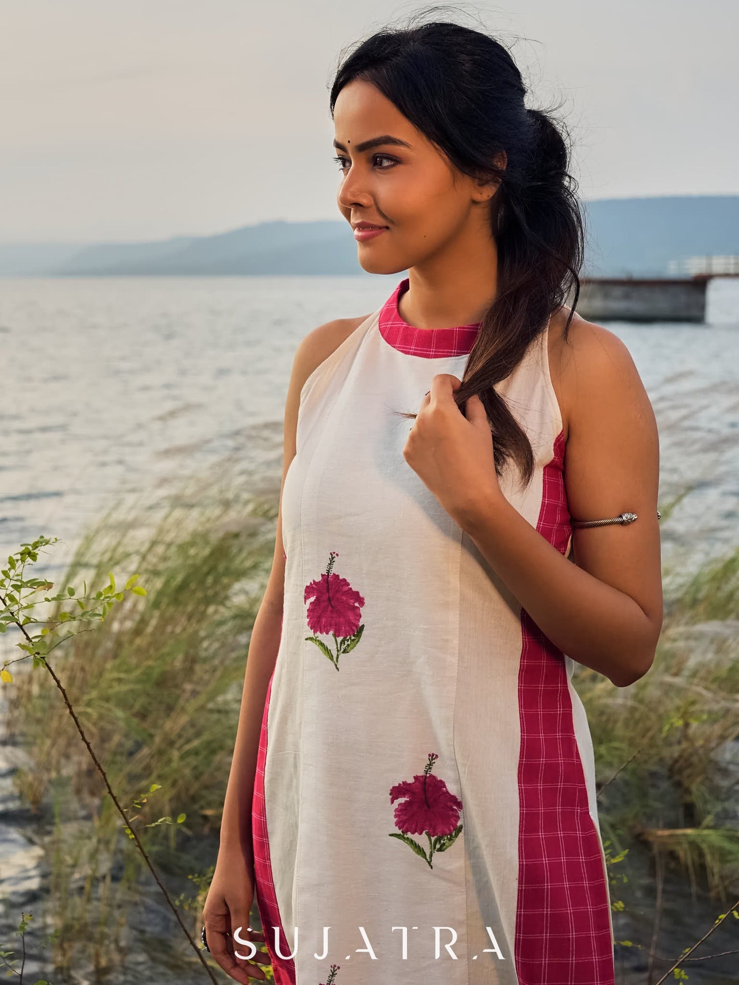 Elegant Off-White Handloom Cotton Kurta with Hibiscus Motifs and Contrast Red Plaid Panels