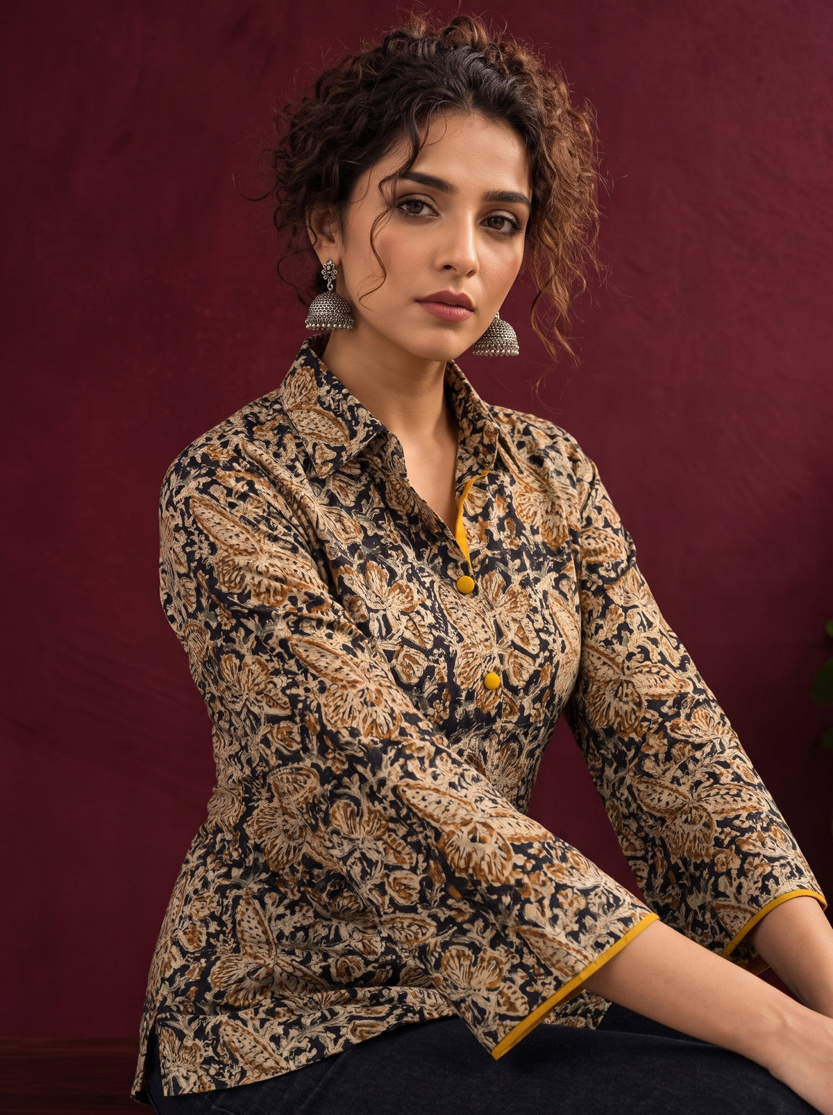Black Kalamkari Printed Cotton Shirt with Floral Motifs — seated