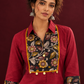 Maroon Cotton Shirt with Contrast Kalamkari Printed Yoke Panel & Sleeve Cuffs with Gold Button Detailing — fabric detail