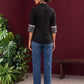 Classic Black Cotton Shirt with Collared Neckline and Contrast Printed Sleeve Cuffs — back view
