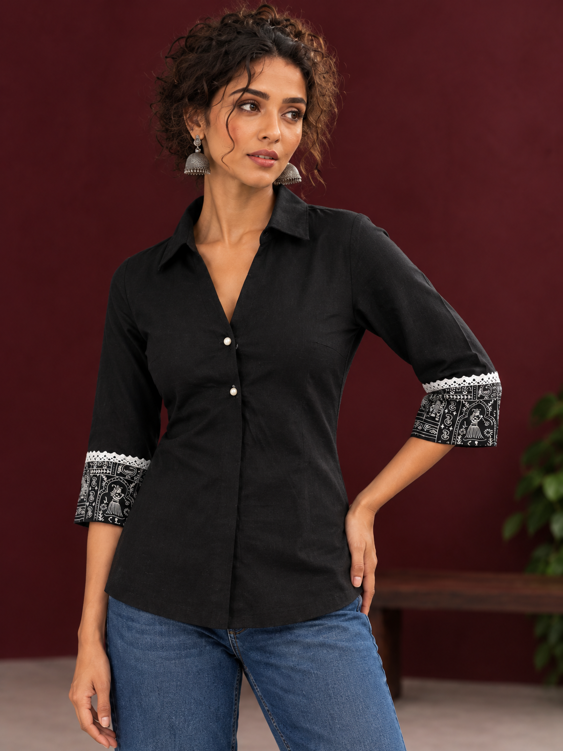 Classic Black Cotton Shirt with Collared Neckline and Contrast Printed Sleeve Cuffs — fabric detail