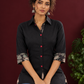 Timeless Black Cotton Shirt with Contrast Floral Print Cuffs and Maroon Button Placket — seated detail