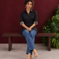 Timeless Black Cotton Shirt with Contrast Floral Print Cuffs and Maroon Button Placket — seated