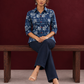 Indigo Blue Cotton Shirt with Floral Print and Contrast Maroon Button Placket — seated