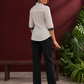 Classic White Cotton Shirt with Black Polka Dot Print and Contrast Lace Cuff Detail — back view