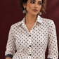 Classic White Cotton Shirt with Black Polka Dot Print and Contrast Lace Cuff Detail — fabric detail