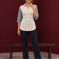 Classic Off-White Cotton Shirt with Teal Abstract Printed Sleeves and Collared Neckline — front view