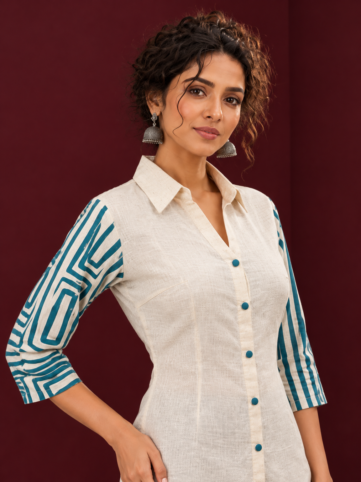 Classic Off-White Cotton Shirt with Teal Abstract Printed Sleeves and Collared Neckline — styled view