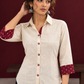 Classic Off-White Cotton Shirt with Maroon Printed Placket & Contrast Sleeve Cuffs — styled view