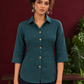 Classic Bottle Green Cotton Shirt with Ajrakh Floral Print Cuffs and Contrast Buttons — styled view