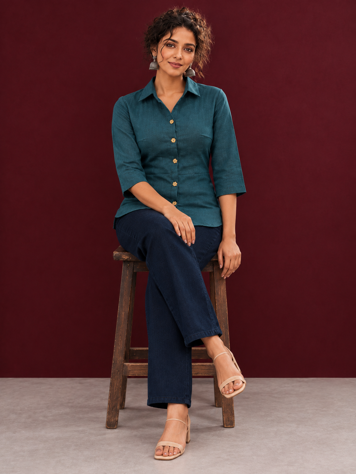 Classic Bottle Green Cotton Shirt with Ajrakh Floral Print Cuffs and Contrast Buttons — seated