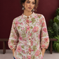 Ivory Cotton Floral Printed Shirt with Mandarin Collar and Lace-Trimmed Balloon Sleeves — fabric detail
