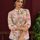 Ivory Cotton Floral Printed Shirt with Mandarin Collar and Lace-Trimmed Balloon Sleeves — styled view