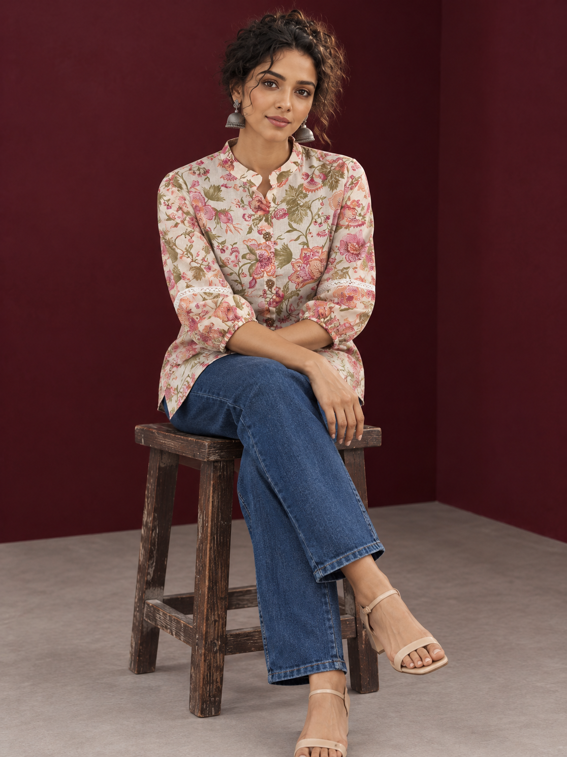 Ivory Cotton Floral Printed Shirt with Mandarin Collar and Lace-Trimmed Balloon Sleeves — seated
