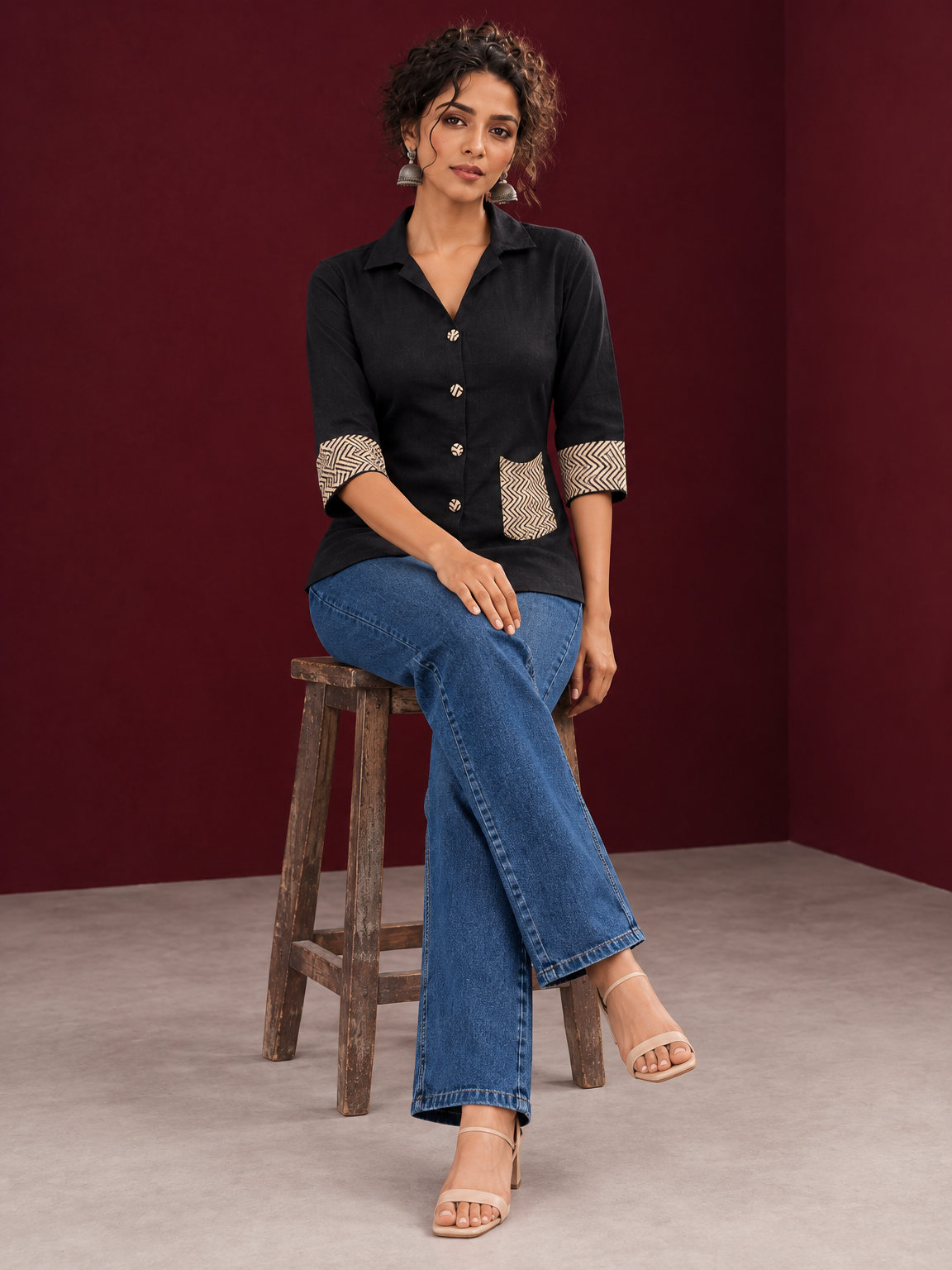 Classic Black Cotton Shirt with Contrast Ajrakh Chevron Print Cuffs & Patch Pocket Detail — seated
