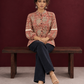 Classic Rust Cotton Shirt with Allover Maroon Print, Mandarin Collar & Lace Trim Sleeves — seated