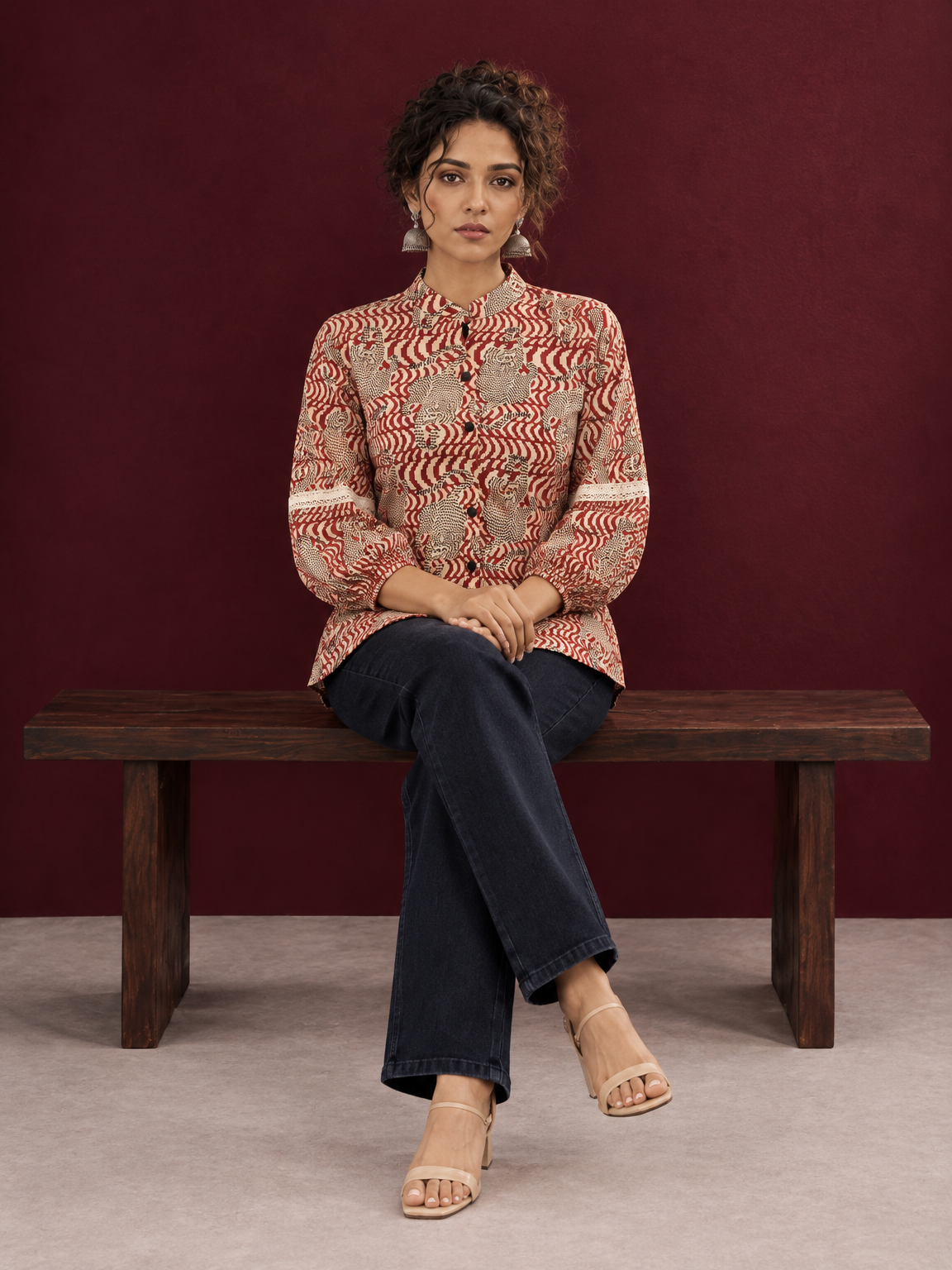 Classic Rust Cotton Shirt with Allover Maroon Print, Mandarin Collar & Lace Trim Sleeves — seated