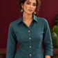 Timeless Teal Blue Cotton Shirt with Collared Neckline and Contrast Floral Buttons — fabric detail