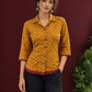 Mustard Bandhani Print Rayon Shirt with Contrast Maroon Hemline and Cuff Detailing — fabric detail