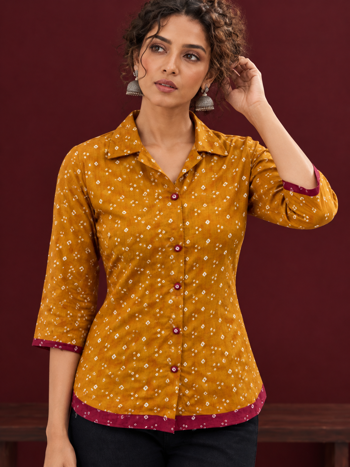 Mustard Bandhani Print Rayon Shirt with Contrast Maroon Hemline and Cuff Detailing — styled view