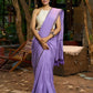 Elegant lilac cotton saree with golden accents and soft handcrafted sophistication