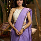 Elegant lilac cotton saree with golden accents and soft handcrafted sophistication
