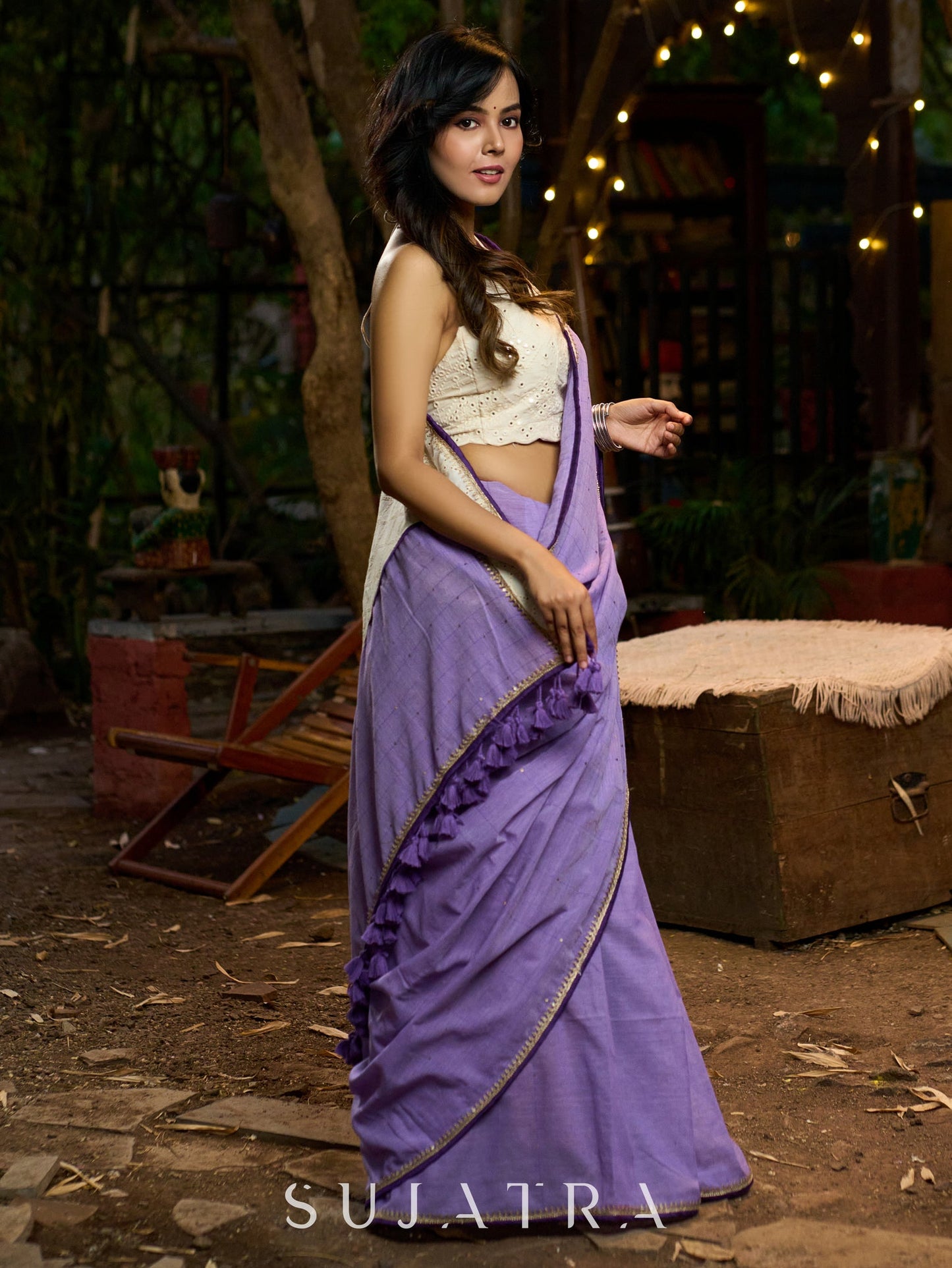 Elegant lilac cotton saree with golden accents and soft handcrafted sophistication