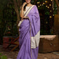Elegant lilac cotton saree with golden accents and soft handcrafted sophistication