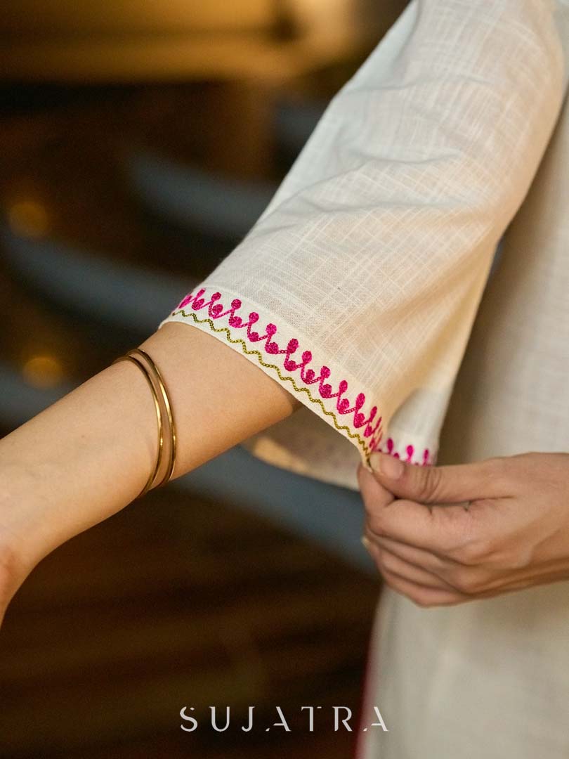 Graceful White Cotton Kurta Adorned with Striking Kashida Embroidery with Graceful Pink Chiffon Dupatta with Delicate Pearl & Mirror Lace