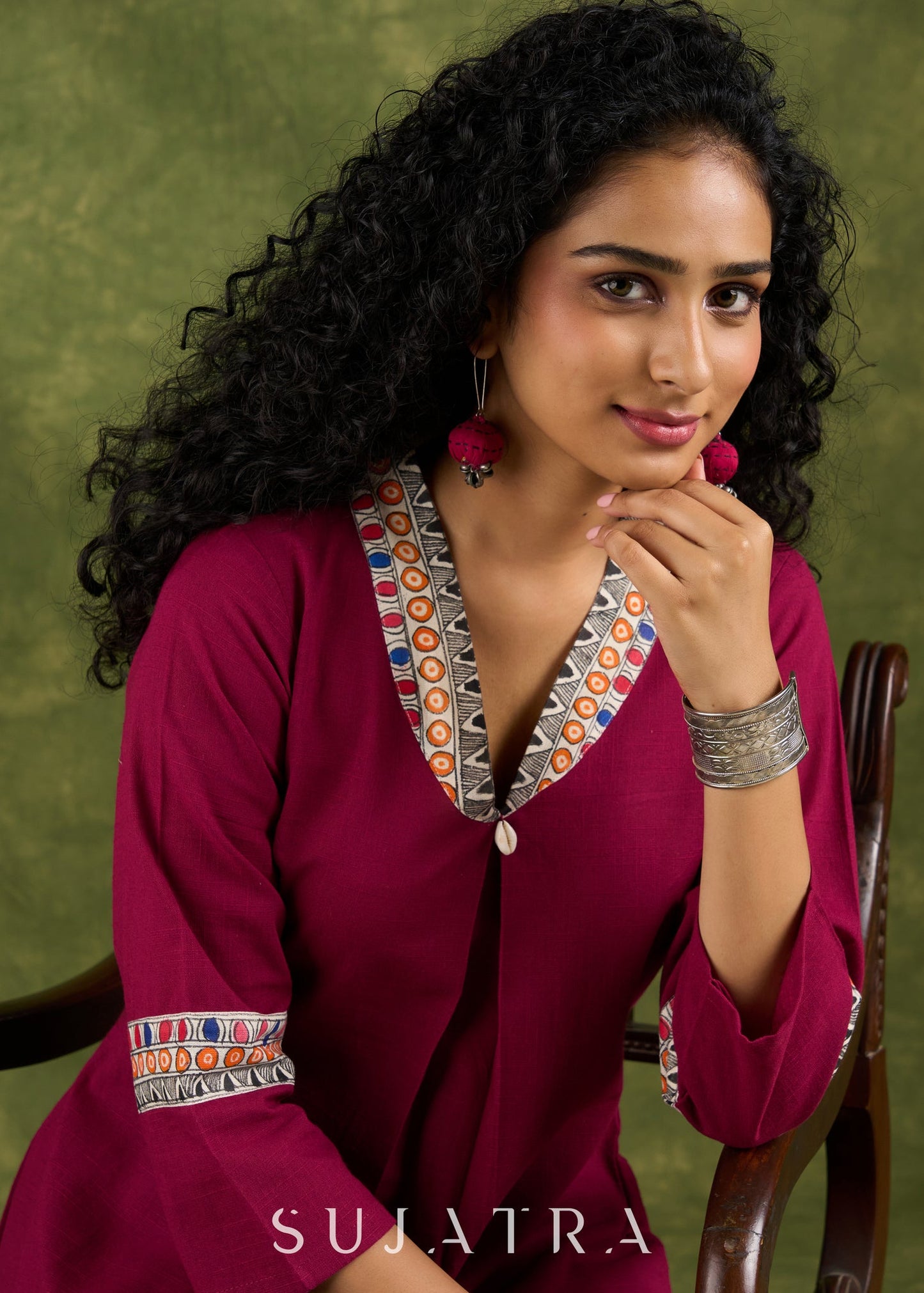 Vibrant Magenta Cotton Top With Traditional Hand Painted Madhubani Details.