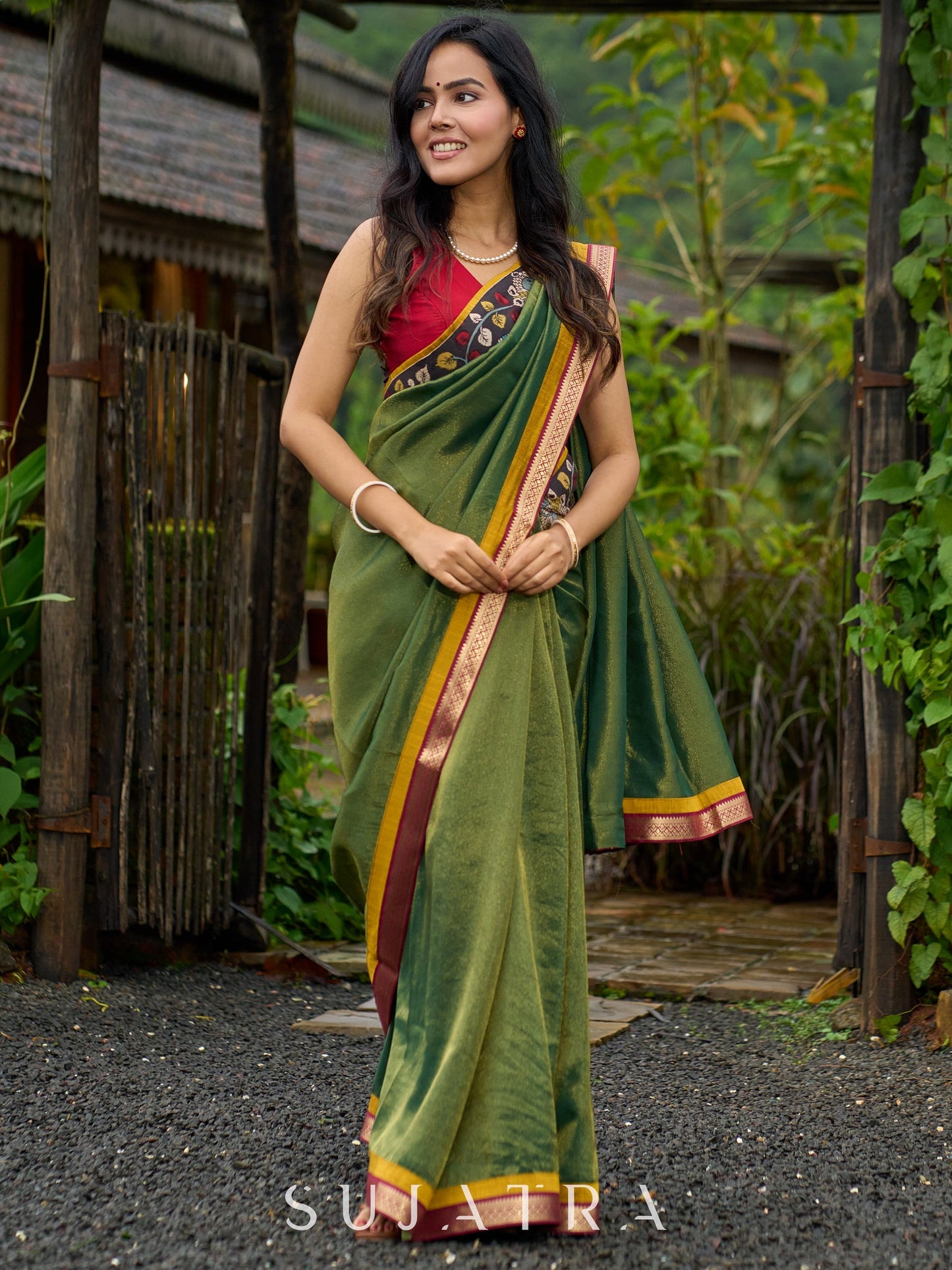 Exclusive green tissue saree with hand painted kalamkari borders & maharashtrian khun border