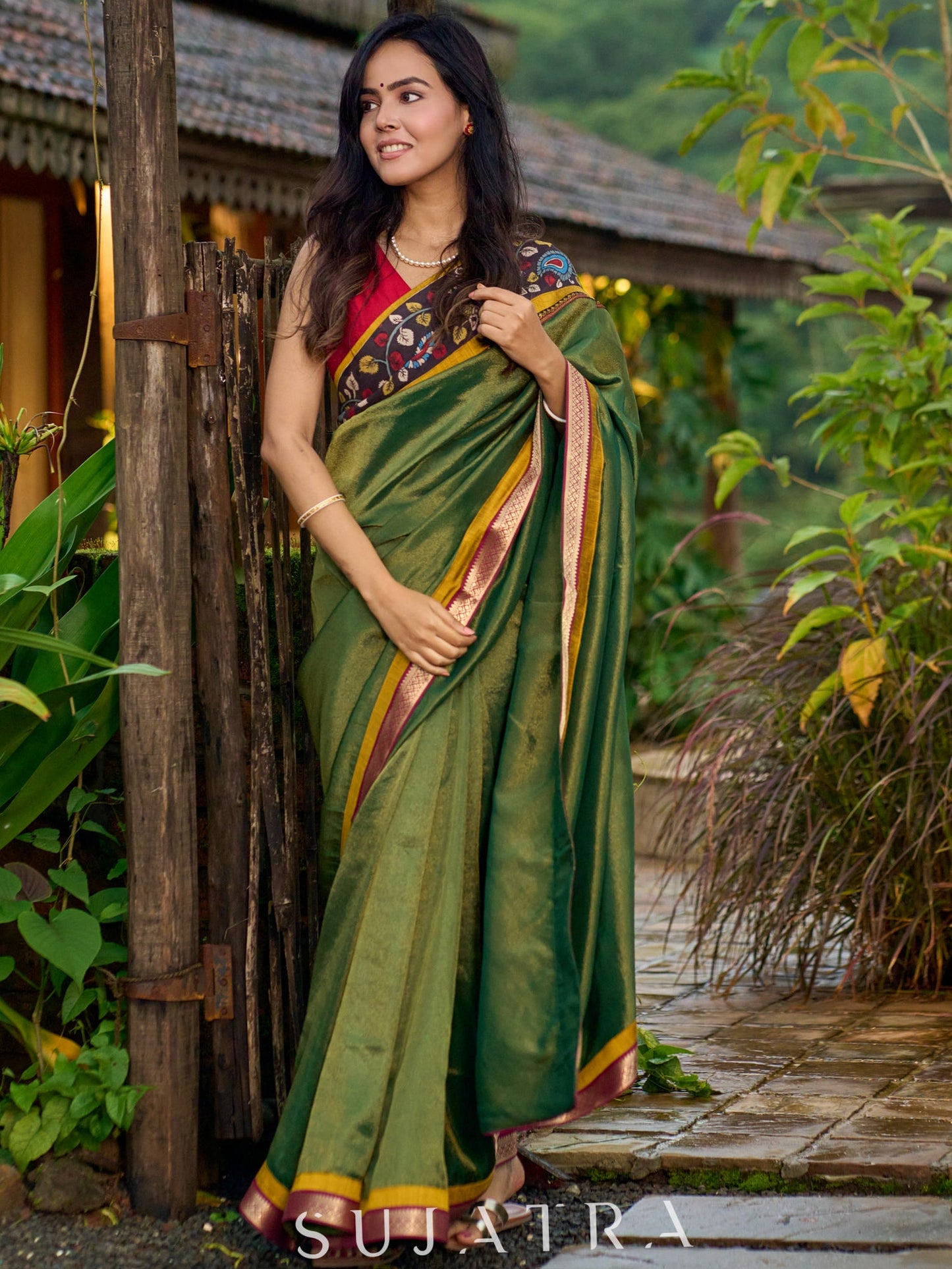 Exclusive green tissue saree with hand painted kalamkari borders & maharashtrian khun border