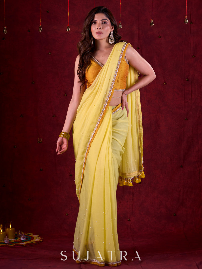 Light Yellow Mul Cotton Saree with Contrasting Mustard Border & Pearl Embroidered Pallu