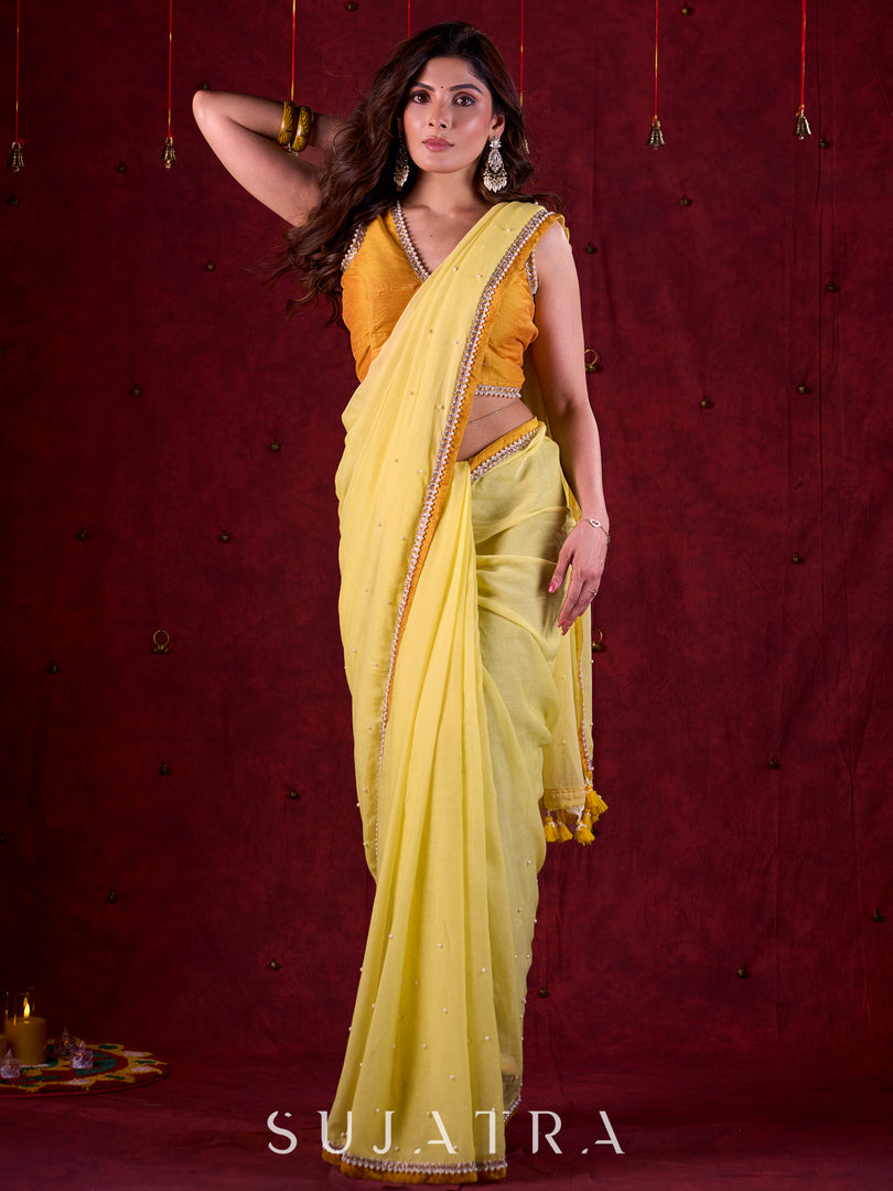 Light Yellow Mul Cotton Saree with Contrasting Mustard Border & Pearl Embroidered Pallu