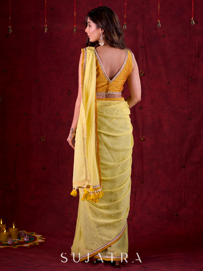 Light Yellow Mul Cotton Saree with Contrasting Mustard Border & Pearl Embroidered Pallu