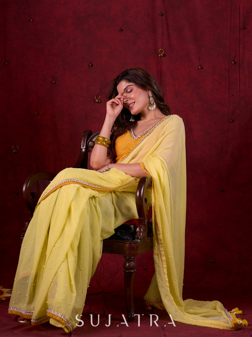 Light Yellow Mul Cotton Saree with Contrasting Mustard Border & Pearl Embroidered Pallu
