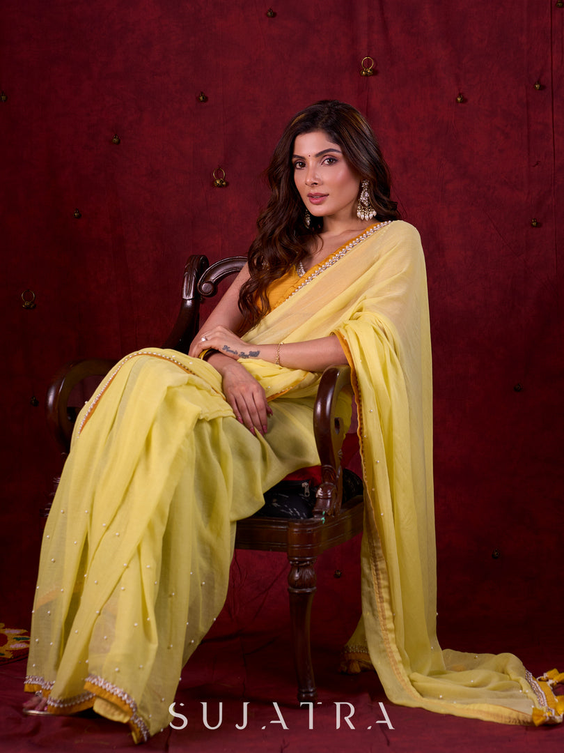Light Yellow Mul Cotton Saree with Contrasting Mustard Border & Pearl Embroidered Pallu