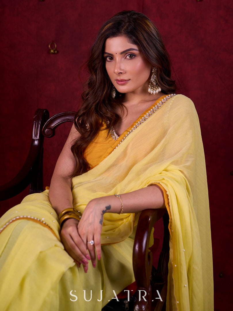 Light Yellow Mul Cotton Saree with Contrasting Mustard Border & Pearl Embroidered Pallu